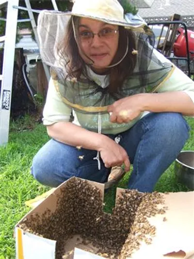 Ella at the beehives
